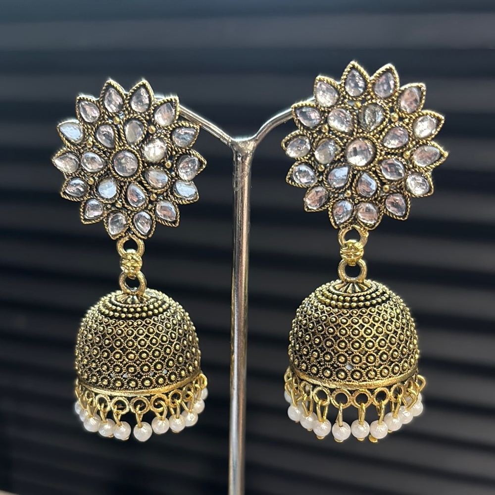 Elegant Gold and White Jhumka Earrings